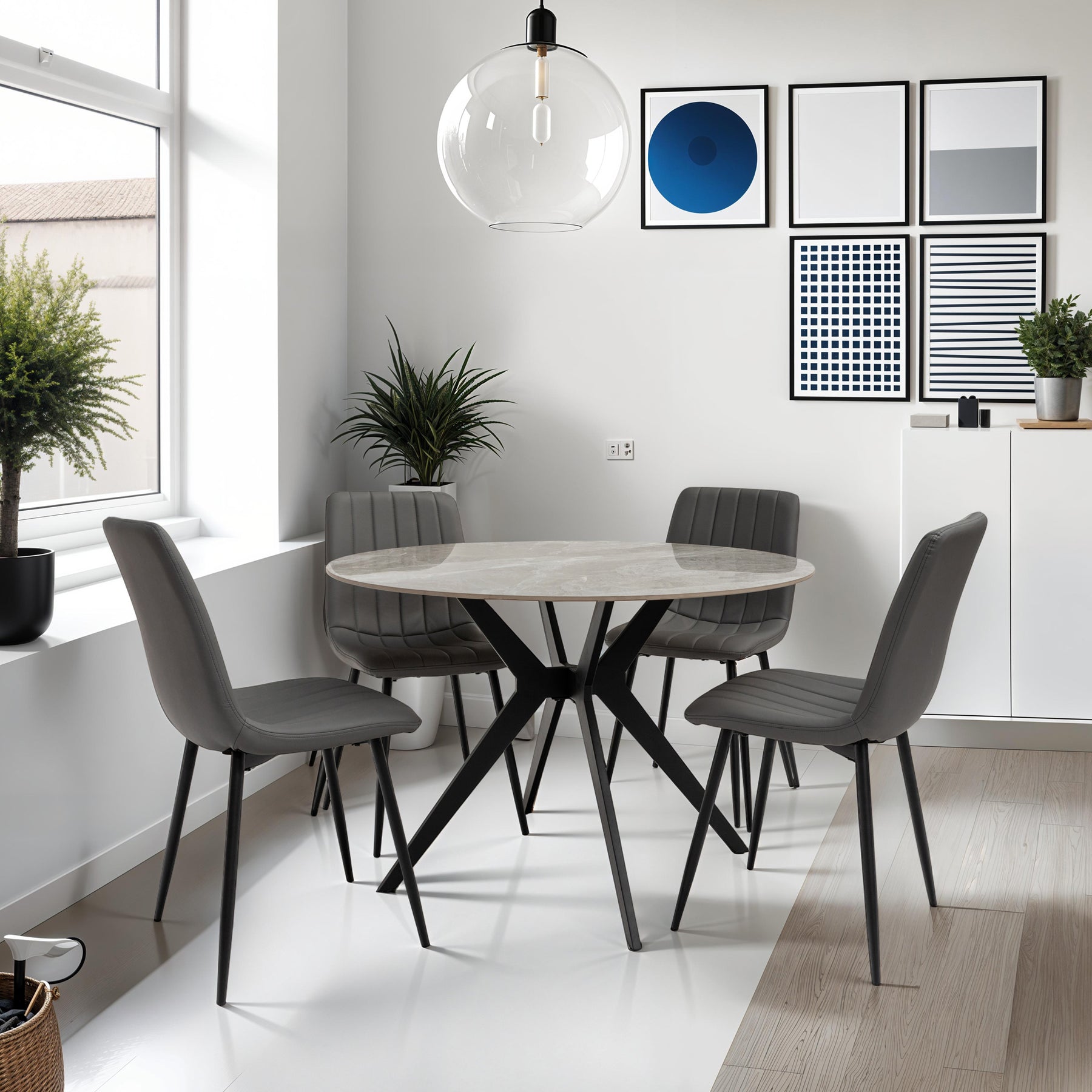 Chelsea-grey-stone-round-dining-table from Roseland Furniture