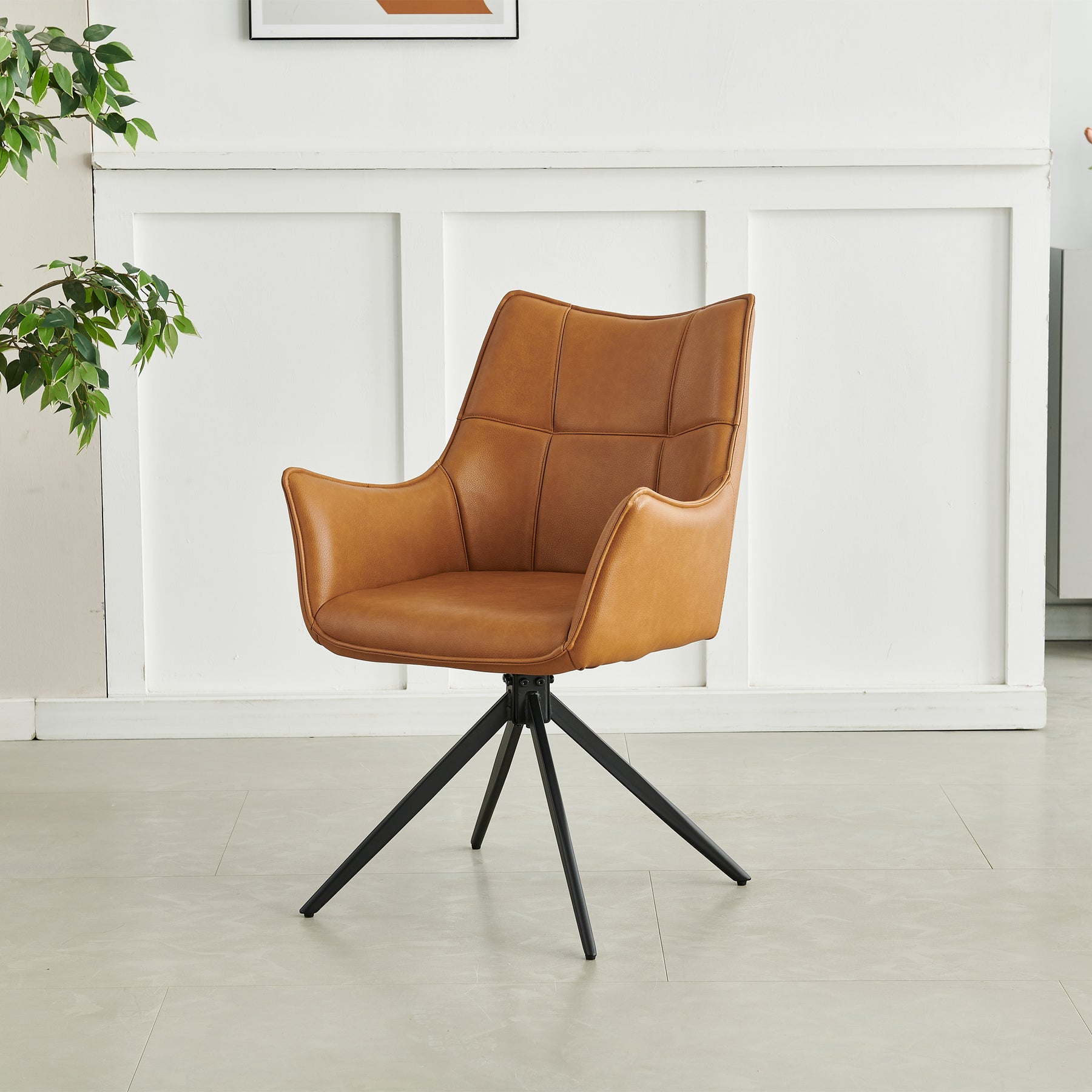 Aksel-Faux-Leather-Wing-Back-Dining-Armchair-Tan from Roseland Furniture
