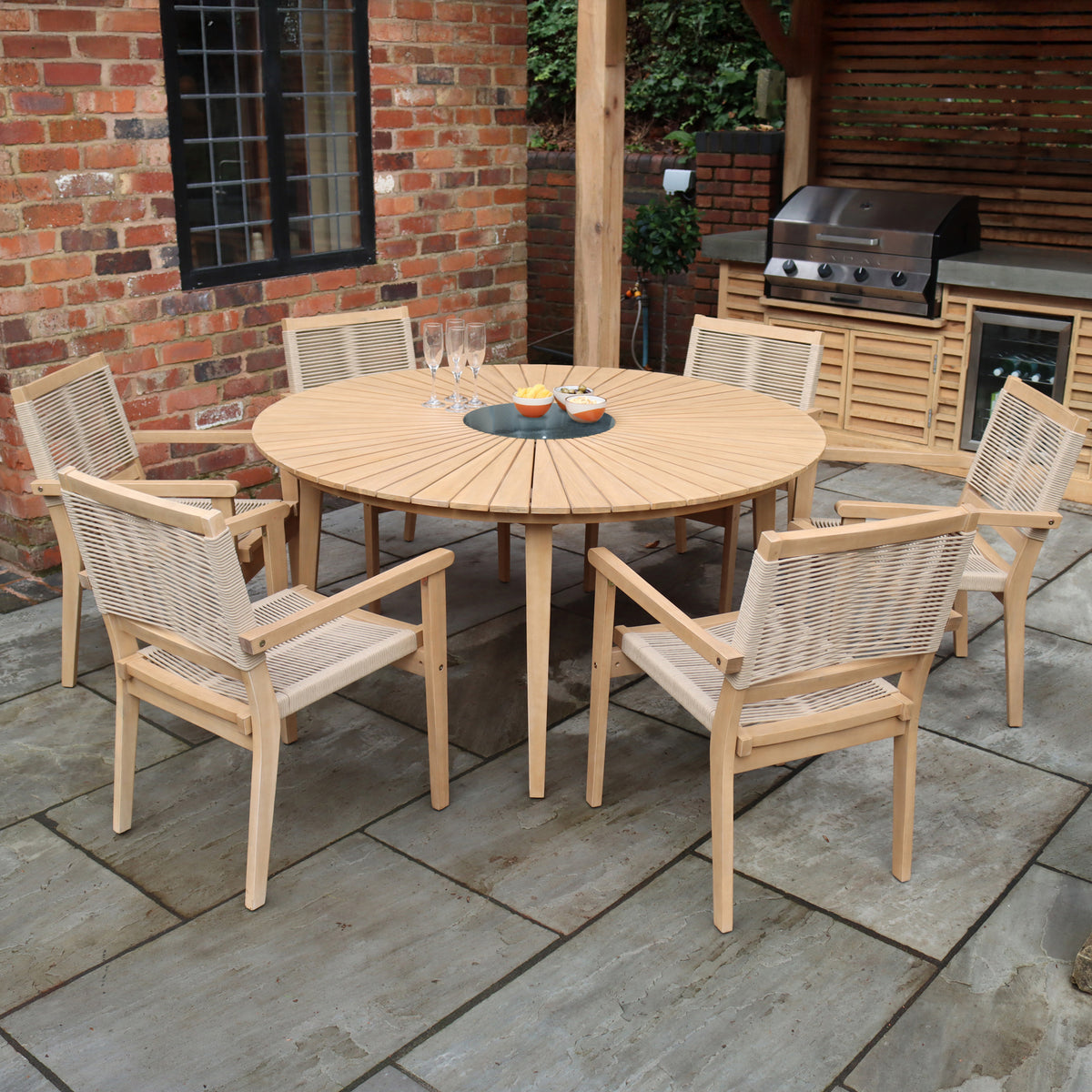 FSC 1 Roma 150cm Round Table w 6 Roma Rope Stacking Chairs Granite Insert Angle1 from Roseland Furniture