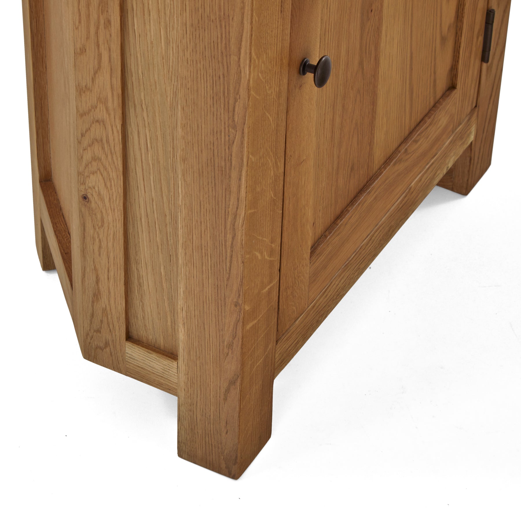 Zelah Oak Corner Display Cabinet - Close up of lower shelf and legs