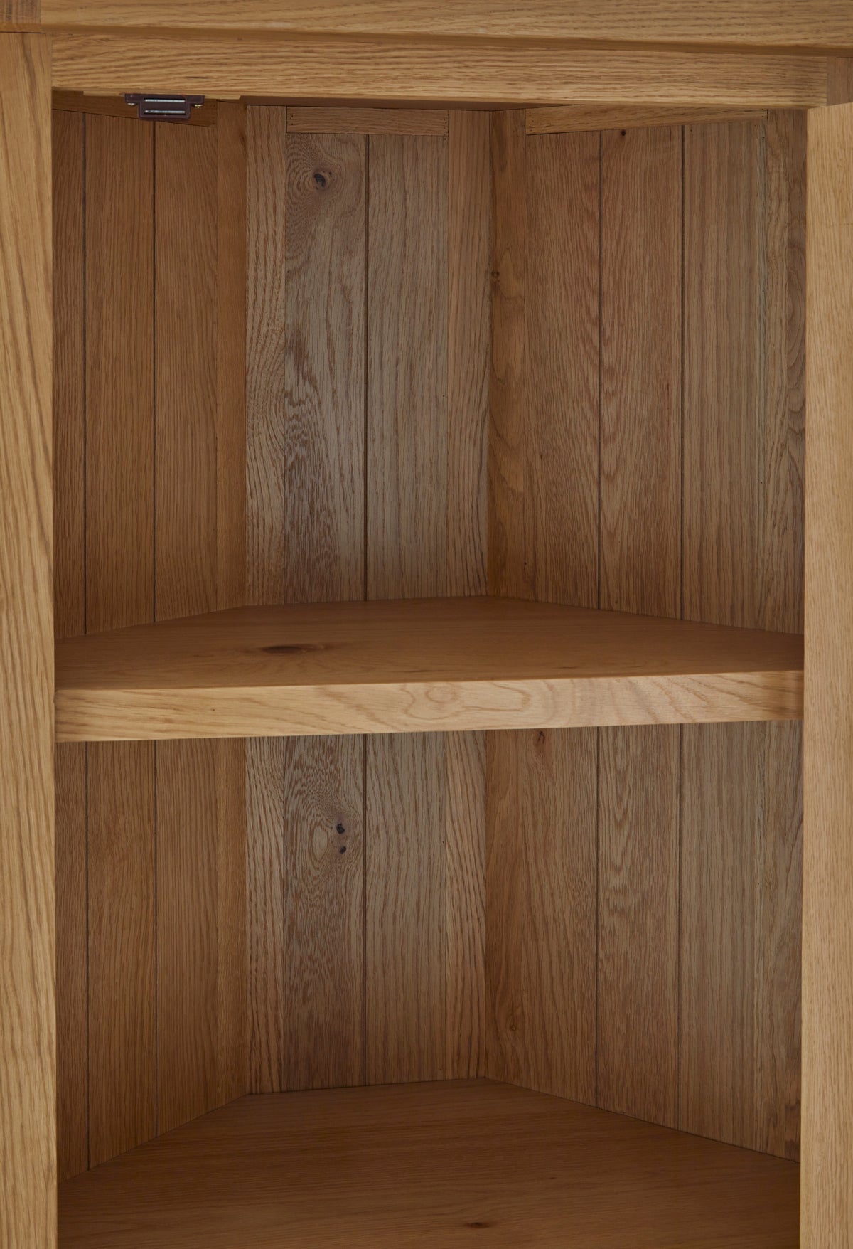 Zelah Oak Corner Display Cabinet
 - Close up of lower shelf and legs
