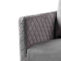 close up of the upholstered velvet fabric on the Bali Grey Velvet Accent Chair