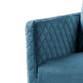 close up of the upholstered velvet fabric on the Bali Peacock Velvet Accent Chair