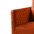 close up of the upholstered velvet fabric on the Bali Apricot Velvet Accent Chair
