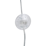 A clear plastic bobbin with thread is suspended against a white background, with the focus on the central spindle and thread winding around it.