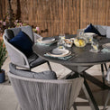 Aspen 4 Seat Stone Look Garden Dining Set close up of round table