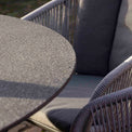 Aspen 6 Seat Stone Look Garden Dining Set close up of table edge