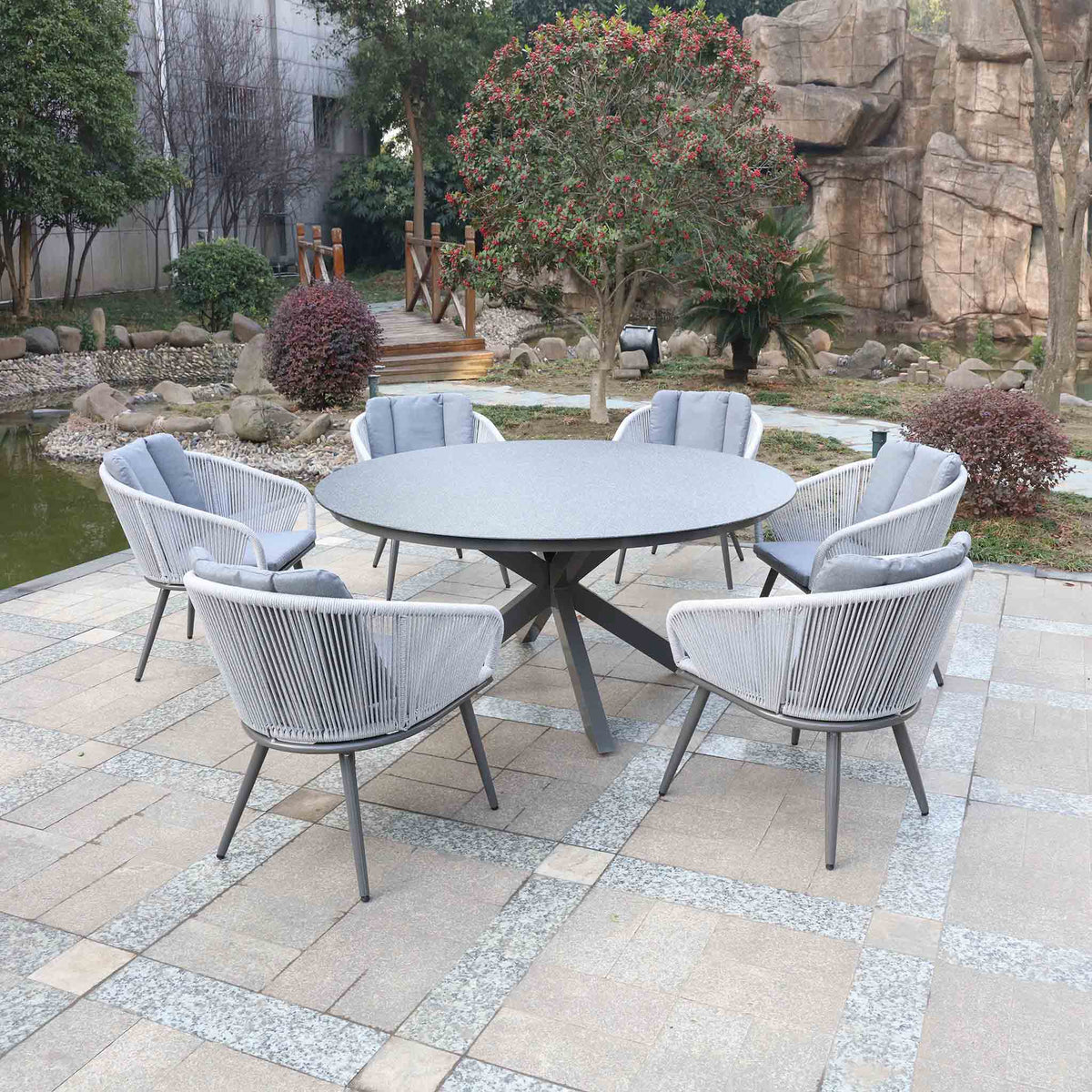 Aspen 6 Seat Stone Look Garden Dining Set from Roseland Furniture