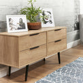 Asher Light Oak 4 Drawer Low Storage Chest with black legs for living room