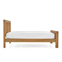 Abbey Grande Oak Bed Frame Double or King Size - Side on view with mattress
