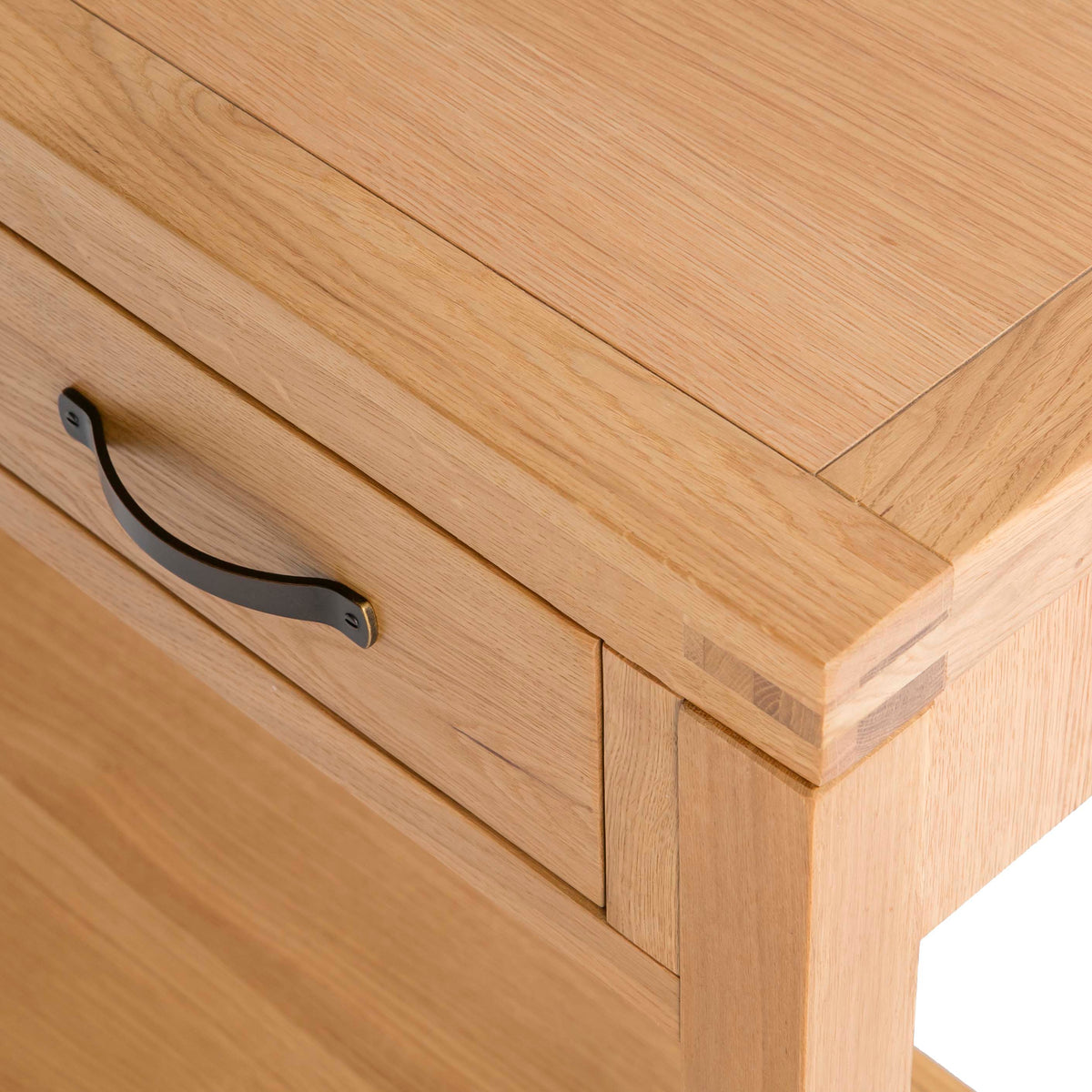  Abbey Waxed Oak Console Table with Drawer - Close up of top corner of console 