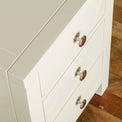 Close up of table edge on The Cornish White Wooden 3 Drawer Bedside Table