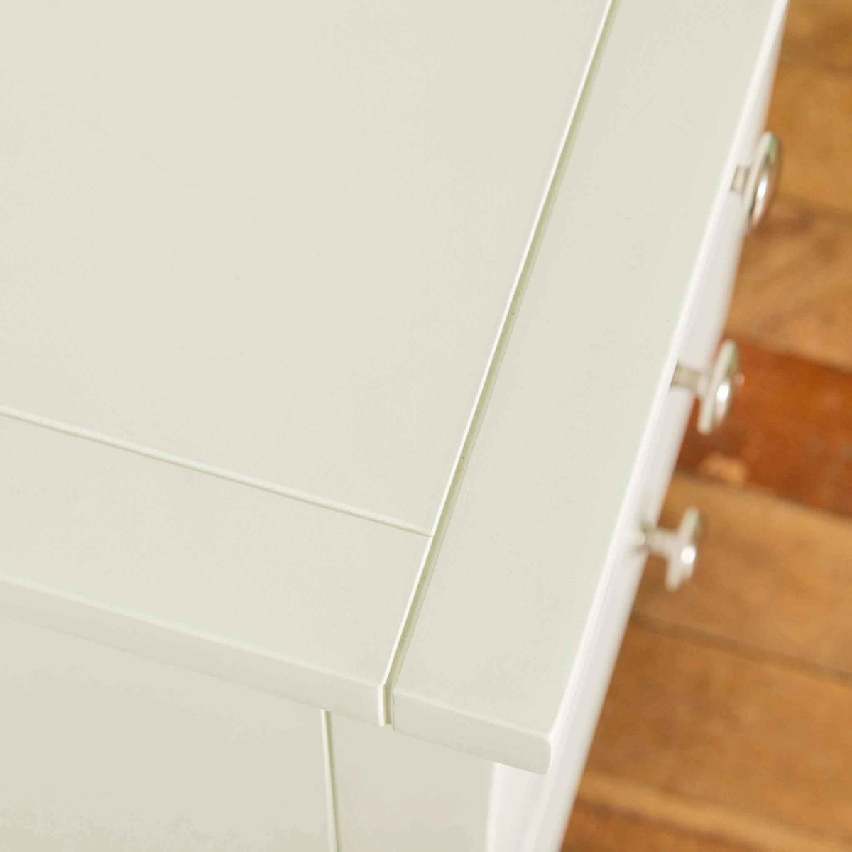 Close up of top surface on The Cornish White Wooden 3 Drawer Bedside Table