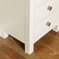 Close up of leg of The Cornish White Wooden 3 Drawer Bedside Table