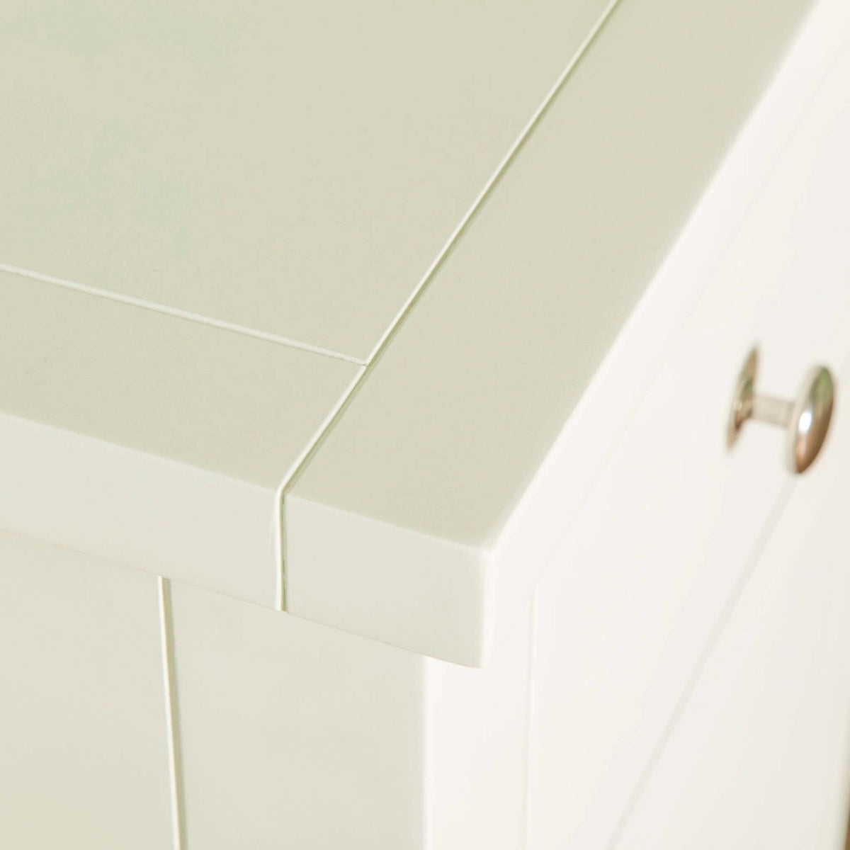 Close up of top corner on The Cornish White Wooden Tallboy Chest of Drawers