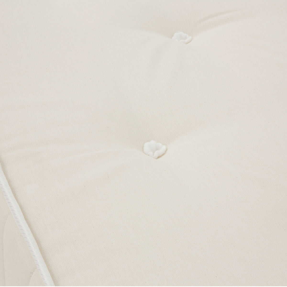 Roseland Sleep Classic Open Coil Mattress close up of cotton tuft