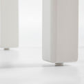 close up of white painted wooden legs on The Padstow White Wooden Dressing Stool with Padded Seat