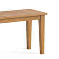 Fran Oak 90cm Dining Bench close up of wooden legs