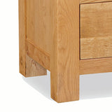 Zelah Oak 5 Drawer Tallboy Chest - Close Up of Tallboy Feet