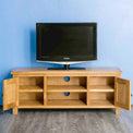 Surrey Oak 120cm TV Stand - Lifestyle with cupboards open