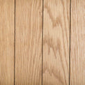 close up of the wooden panels on the Surrey Oak Large Bookcase by Roseland Furniture