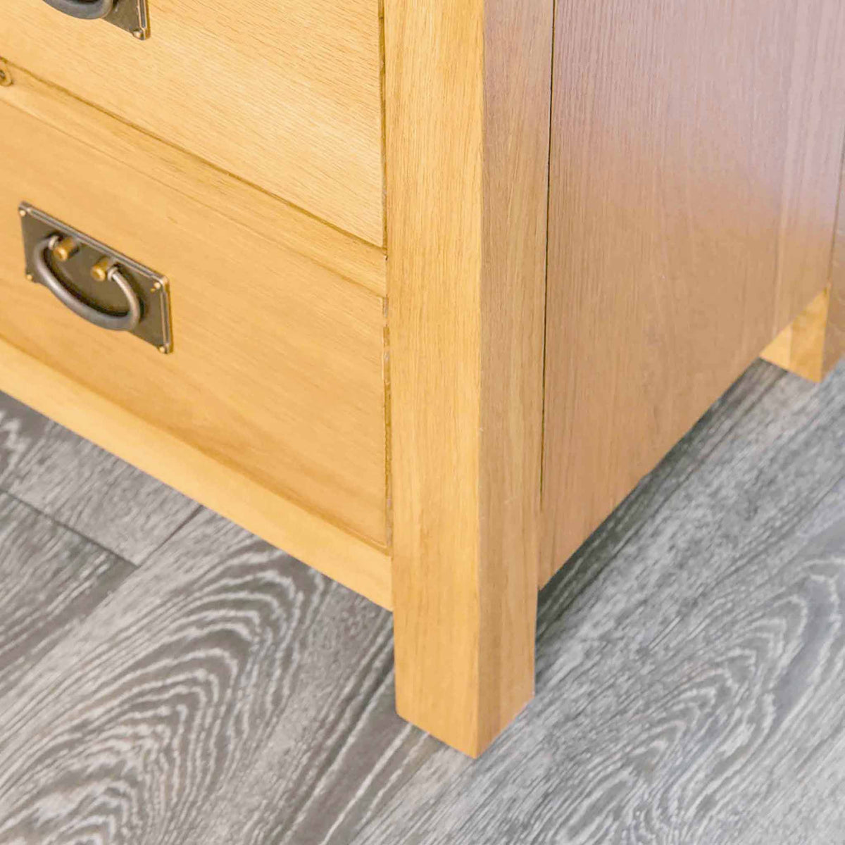 Surrey Oak 2 Over 3 Chest of Drawers - Close up of feet