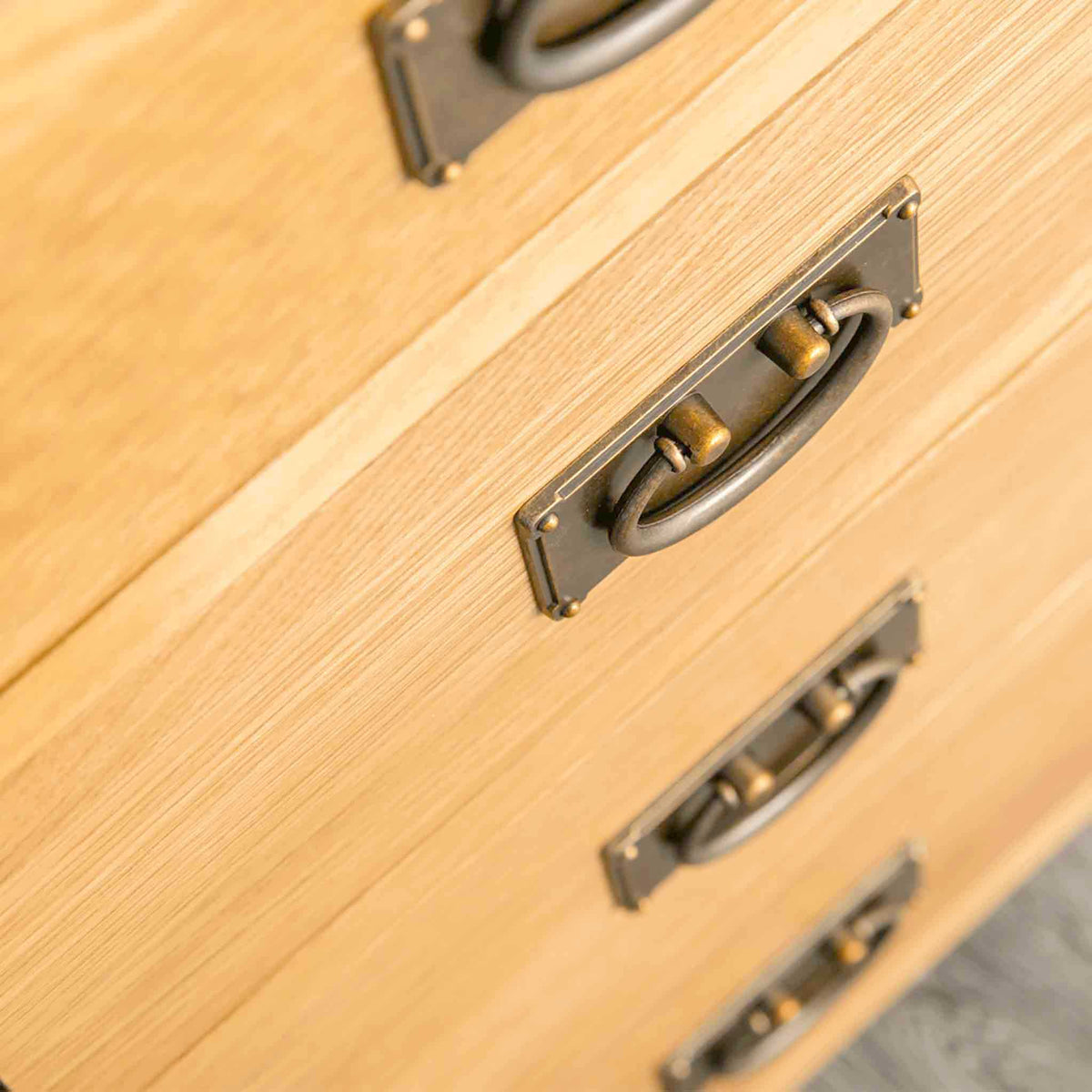Surrey Oak 2 Over 3 Chest of Drawers - Looking down on drawer handles
