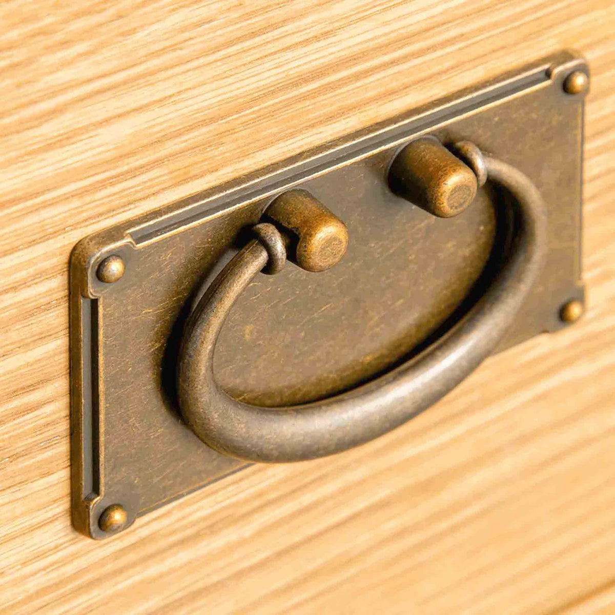 Surrey Oak 2 Over 3 Chest of Drawers - Close up of handle