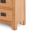 Surrey Oak 5 drawer tallboy chest of 5 drawers - Close up of base of tallboy