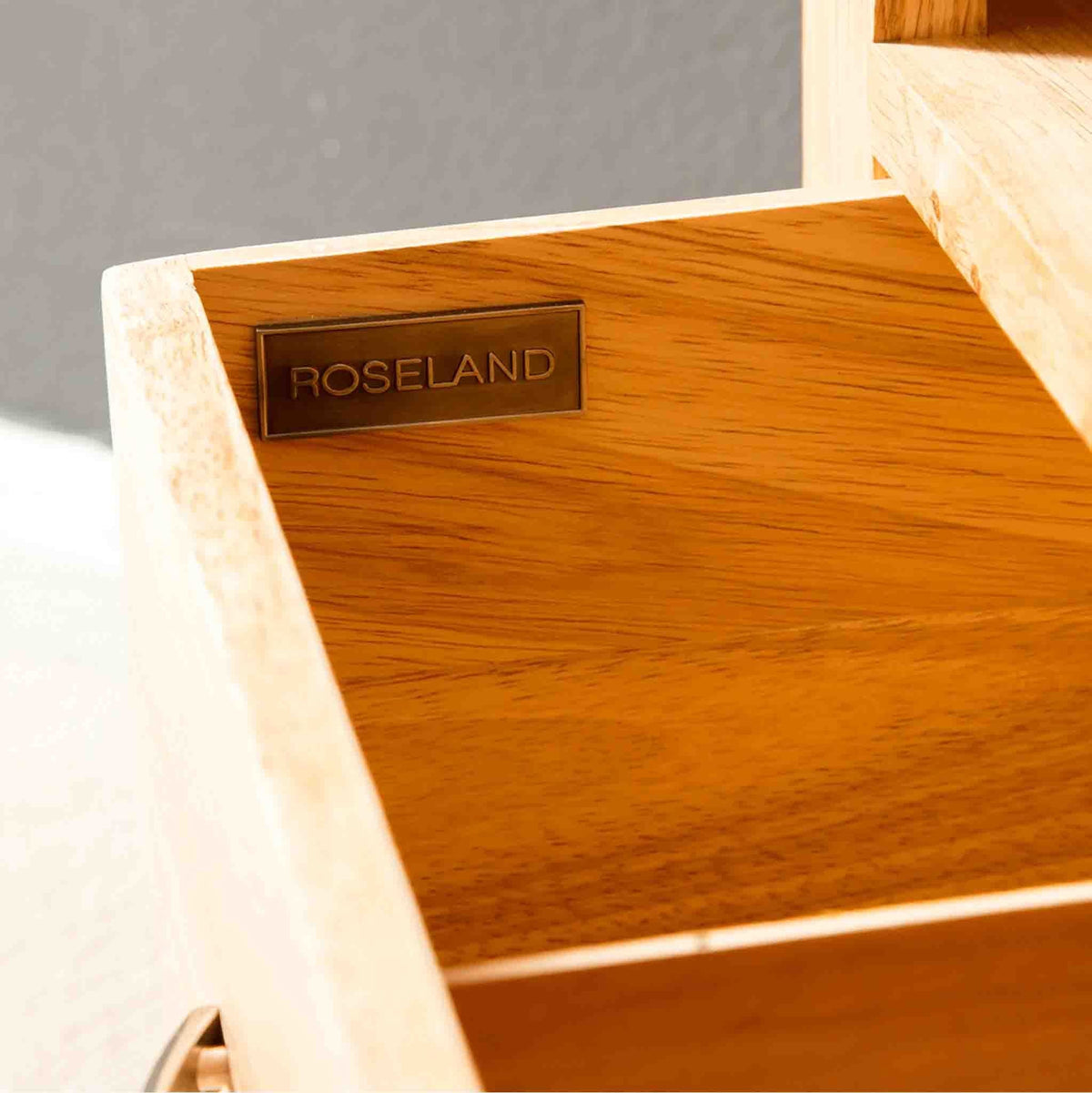 Roseland tag inside a drawer on a London Oak Corner TV Stand