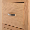close up of the middle drawer on the  London Oak Tallboy Chest