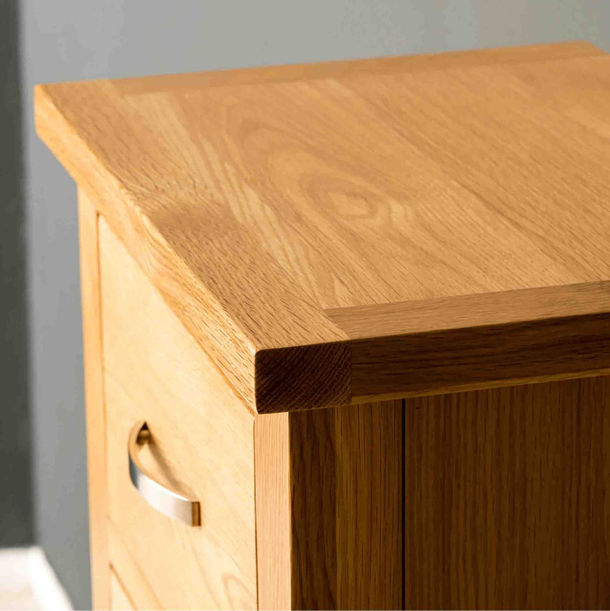 Close up of the top surface of a London Oak Tallboy Chest.