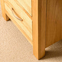 Feet on a London Oak Tallboy Chest.