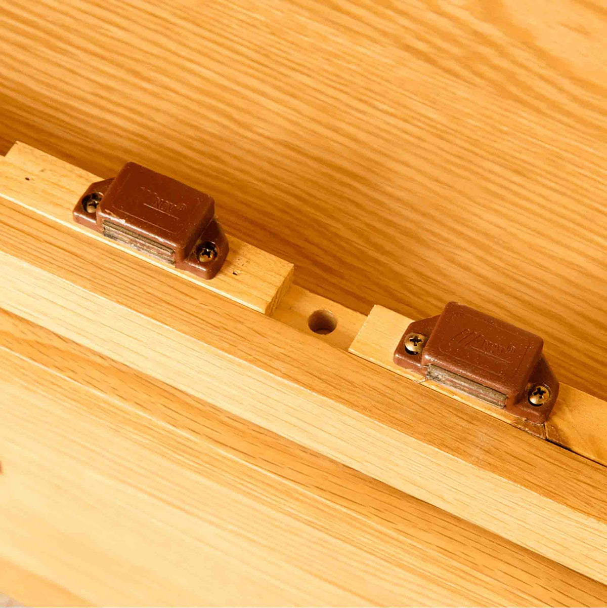 Magnets hold the doors closed on a Roseland Furniture wardrobe. 