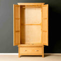 View inside a free standing double wardrobe. 