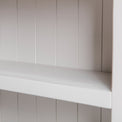 Close up of the bookcase back panels on the Farrow Grey Low Bookcase