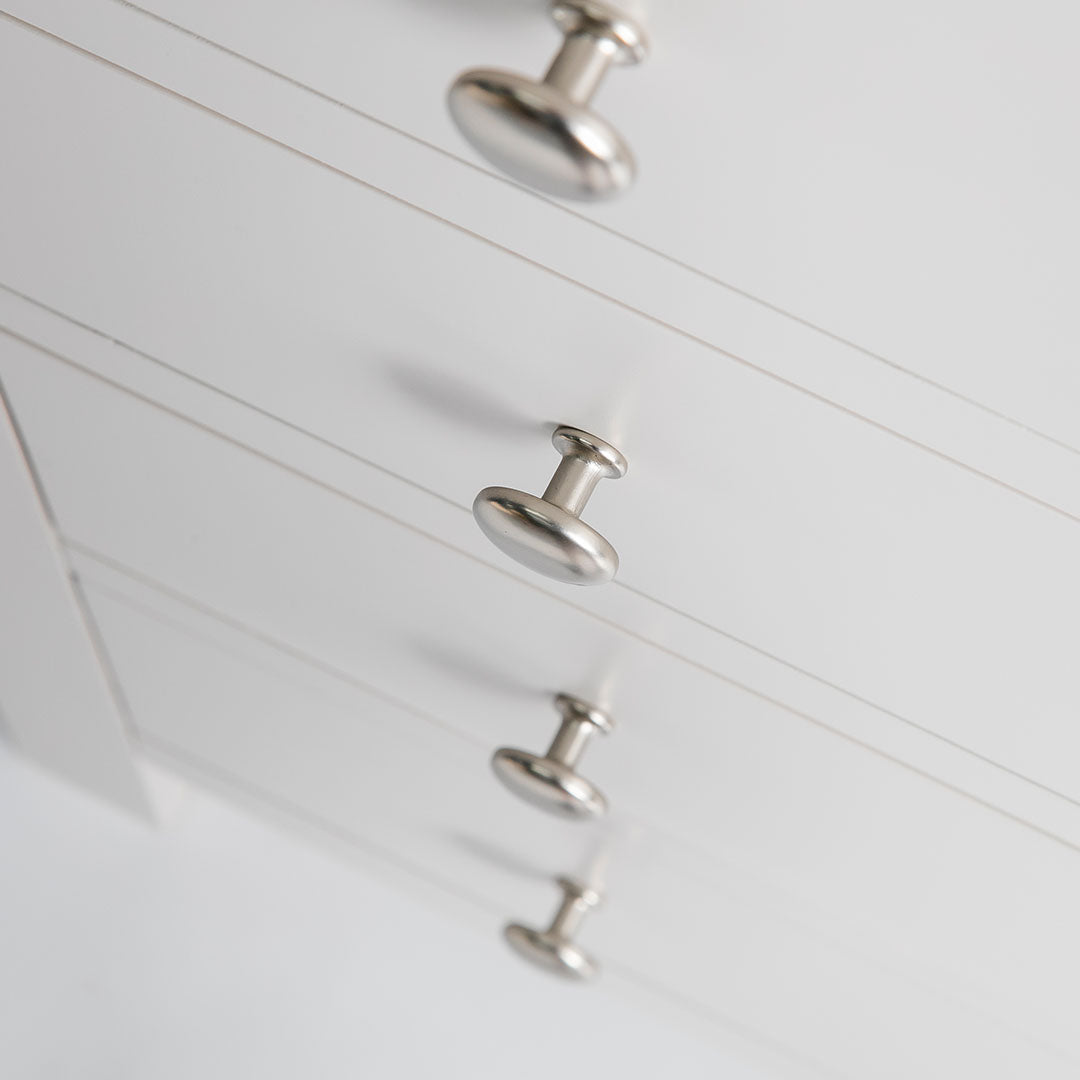 Close up of the drawer handles on the Farrow Grey Tallboy Chest of Drawers