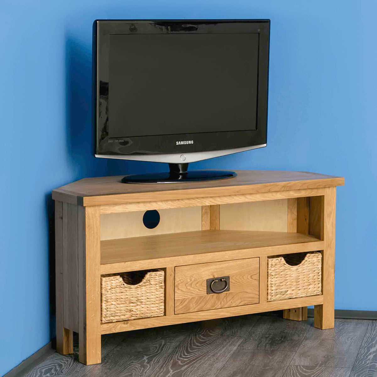 Surrey Oak Corner TV Stand with Baskets by Roseland Furniture - Lifestyle side view