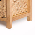 London Oak Coffee Table with Baskets by Roseland Furniture - Close up of feet on table