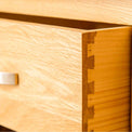 Dovetail joints on a London Oak Console Table with baskets. 