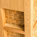 Side of a London Oak Console Table with baskets. 