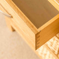 Open drawer on a London Oak Console Table with baskets. 