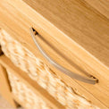 Metal handle on a London Oak Console Table with baskets. 