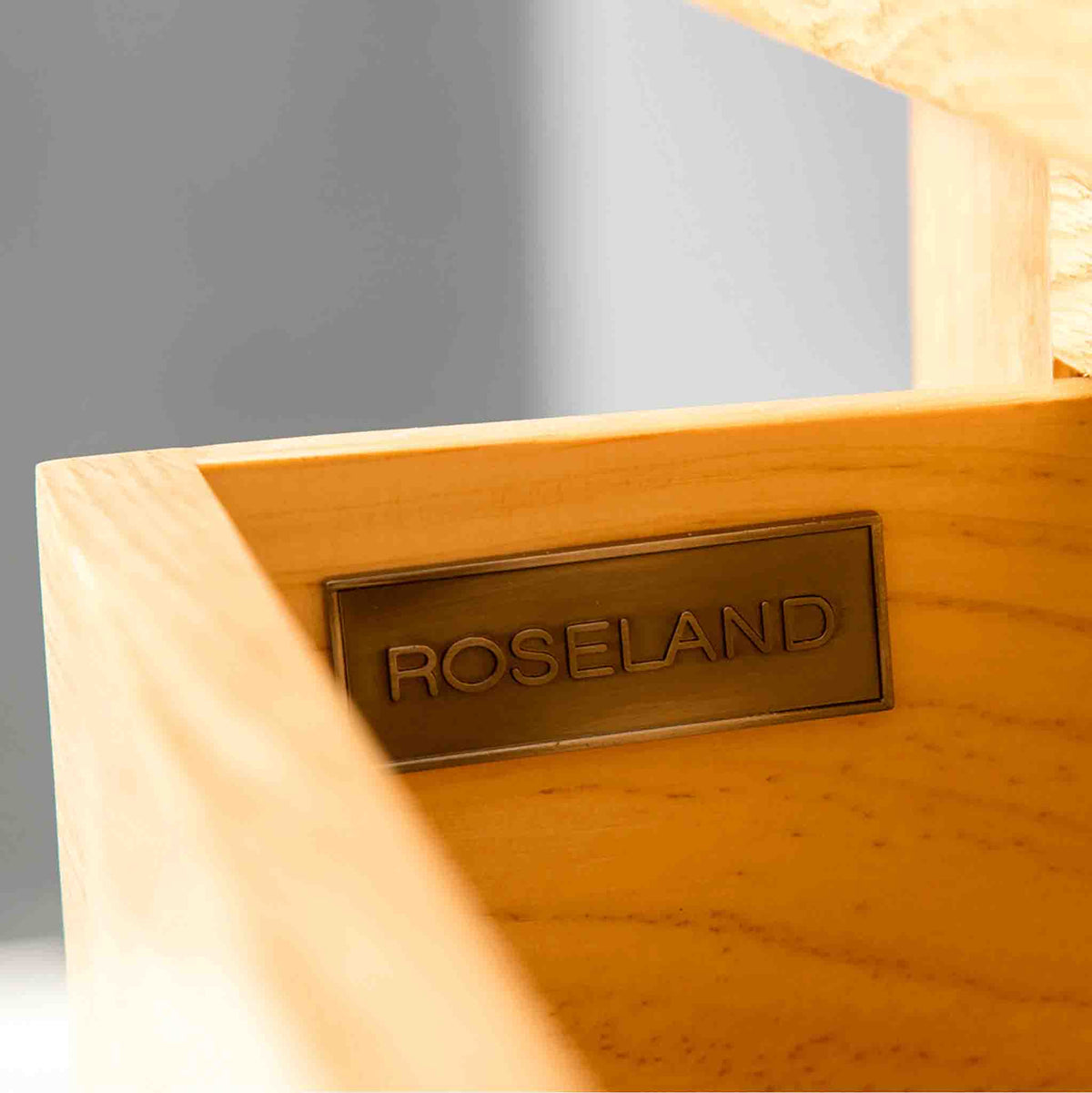 Roseland Furniture badge on a London Oak Hall Table with Baskets. 