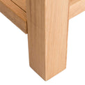 Abbey Light Oak Console Table - Close up of foot of console table
