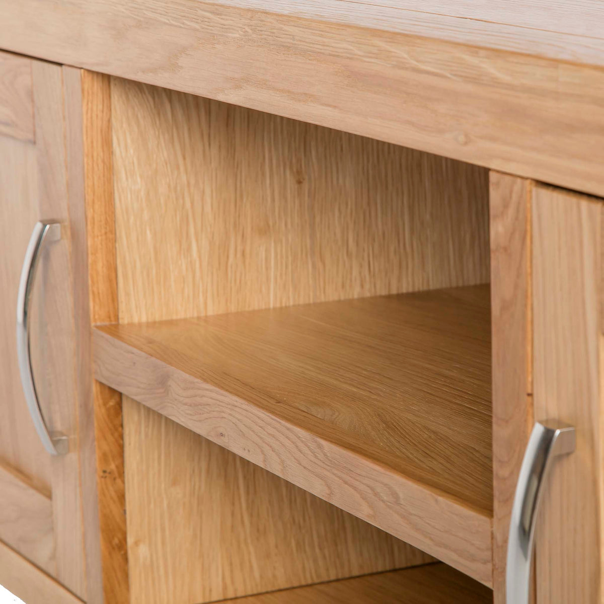 The Abbey Light Oak Large TV Stand - Close up of mid section shelves