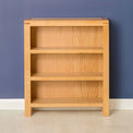 Abbey Light Oak Low Bookcase - Lifestyle front view