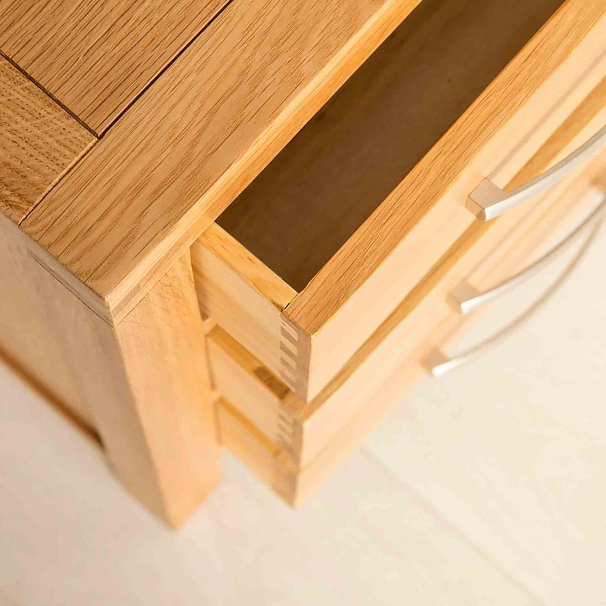 Storage Drawers view of the Abbey Light Oak Bedside Cabinet by Roseland Furniture