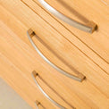 Chrome Metal Handles of the Abbey Light Oak Chest of Drawers by Roseland Furniture