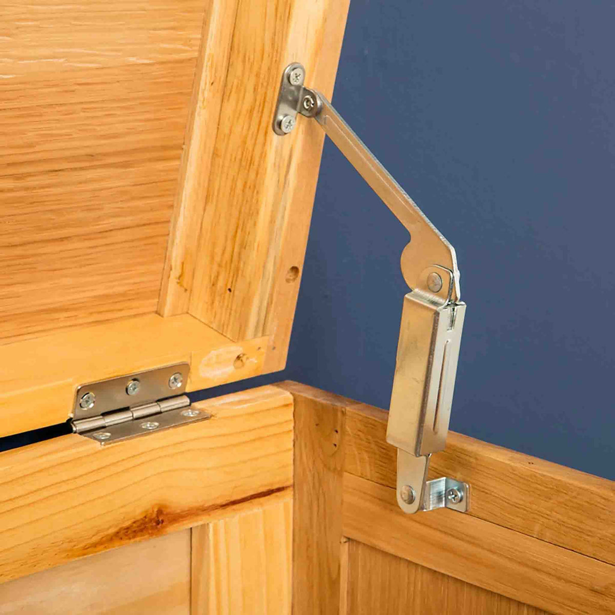 Sprung hinge view of the Abbey Light Oak Storage Box by Roseland Furniture